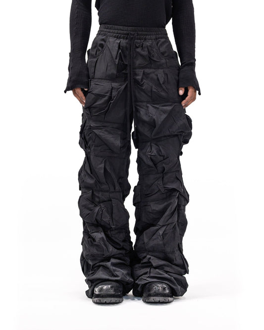 BLACK NYLON PLEATED PANTS