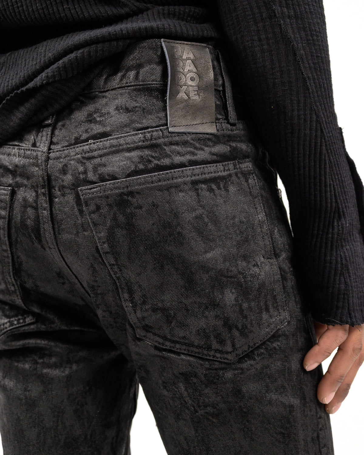 COATED BLACK DENIM