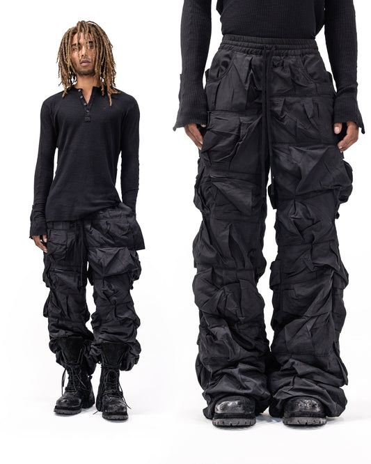 BLACK NYLON PLEATED PANTS